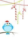 Cute little bird with Christmas candies Royalty Free Stock Photo