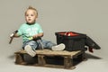 Cute little blond boy holding hammer, Royalty Free Stock Photo