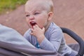 St. Petersburg, Russia, August 5, 2019.Cute little blond boy is walking in the clear summer weather in the park. The