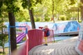 Cute little blond caucasian boy, kid or child looking through binoculars on playground outdoors Royalty Free Stock Photo