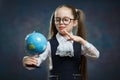 Cute Little Blond Schoolgirl Hold World Globe