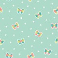 Cute little bows and hearts scattered on pastel blue background seamless vector