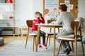 Cute little boy with ADHD during session with professional therapist Royalty Free Stock Photo