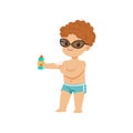 Cute little boy applying sunscreen, kid playing at the beach, happy infants outdoor activity on summer vacations vector