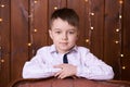 Cute little boy. Beautiful portrait. Brown background Royalty Free Stock Photo