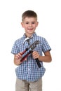 Cute little boy in blue checkered shirt, holding building instruments, isolated on white background Royalty Free Stock Photo