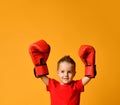 Cute little boy with boxing gloves