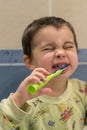 Cute little boy brushing teeth. little baby boy with tooth brush. verical photo Royalty Free Stock Photo