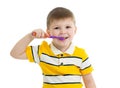 Cute little boy brushing teeth, isolated on white Royalty Free Stock Photo