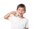 Cute little boy brushing teeth on white background Royalty Free Stock Photo