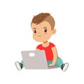 Cute little boy character using laptop while sitting on the floor vector Illustration on a white background Royalty Free Stock Photo