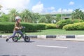 Cute little  boy child wearing safety helmet learning to ride first balance bike run bike in sunny summer day, Kid playing Royalty Free Stock Photo