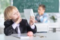 Cute little boy counting money Royalty Free Stock Photo