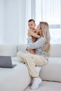 Cute little boy and cuddle pretty young mum show love and affection, relaxing Royalty Free Stock Photo