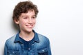 Cute little boy with curly hair smiling Royalty Free Stock Photo