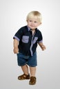 Cute little boy dancing and playing Royalty Free Stock Photo