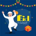 Cute little boy dancing on retro blue color background for Eid Mubarak. Royalty Free Stock Photo