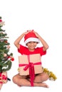 Cute little boy decorating Christmas tree Royalty Free Stock Photo
