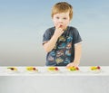 Cute little boy with delicious fruit cake Royalty Free Stock Photo