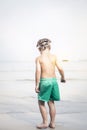 Cute little boy with diving glasses at the beach, thailand Royalty Free Stock Photo