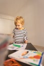 Cute little boy drawing with color pencils Royalty Free Stock Photo