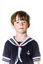 Cute little boy dressed in sailor suit