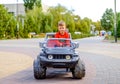 Cute little boy driving a toy truck Royalty Free Stock Photo