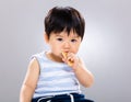 Cute little boy eating cookie Royalty Free Stock Photo