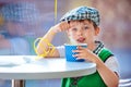 Cute little boy eating ice cream at indoor cafe Royalty Free Stock Photo