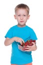 Cute little boy eats strawberry Royalty Free Stock Photo