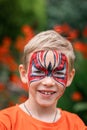 Cute little boy with his face painted