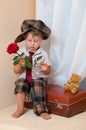 Cute little boy with the flower.