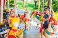 Cute little boy and girl enjoying in funfair and riding on colorful carousel house Royalty Free Stock Photo