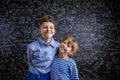 Cute little boy and girl in front of a big Royalty Free Stock Photo