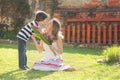 Cute little boy, giving present to his mom for Mothers day Royalty Free Stock Photo