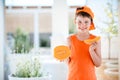 Cute little boy holding sliced orange cantaloupe melon in hands Royalty Free Stock Photo