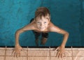 Cute little boy in indoor pool Royalty Free Stock Photo