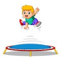 Cute Little boy jumping on trampoline Royalty Free Stock Photo