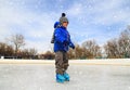 Cute little boy learning to skate in winter Royalty Free Stock Photo