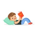 Cute little boy lying on a pillow and reading a book, kid enjoying reading, colorful character vector Illustration
