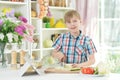 Cute little boy making dinner Royalty Free Stock Photo