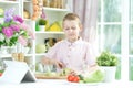 Cute little boy making dinner Royalty Free Stock Photo