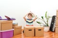 Cute little boy in new house. Housing a young family with kid. Family moves into a new apartment Royalty Free Stock Photo