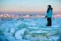 Cute little boy outdoors playing on winter beach Royalty Free Stock Photo