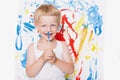 Cute little boy painting with brush. School. Preschool. Education. Creativity Royalty Free Stock Photo