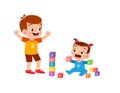 cute little boy play with baby sibling together Royalty Free Stock Photo