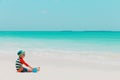 Cute little boy play with water and sand on beach Royalty Free Stock Photo