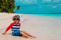 Cute little boy play with water and sand on beach Royalty Free Stock Photo