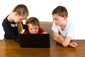 3 kids on a laptop Royalty Free Stock Photo