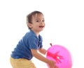 Cute little boy is playing with pink balloon Royalty Free Stock Photo
